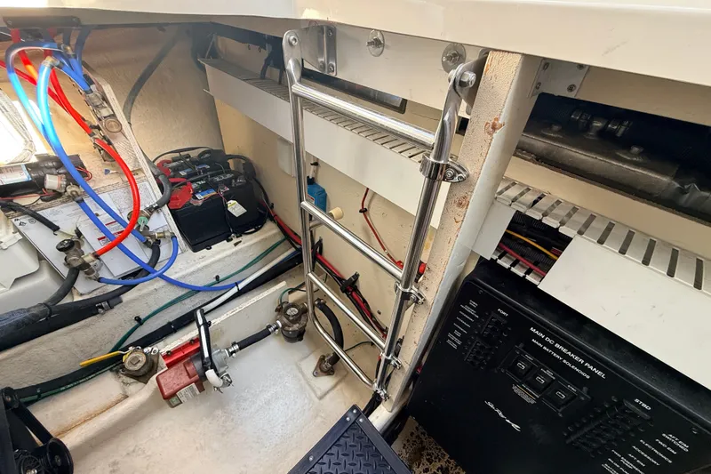 Slide: The Image of Engine compartment of 2008 Sea Ray 340 Sundancer with wiring and ladder. - 45