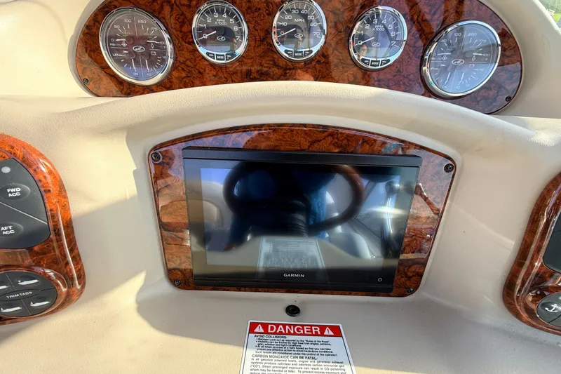 Slide: The Image of Dashboard of a 2008 Sea Ray 340 Sundancer with Garmin navigation system. - 16