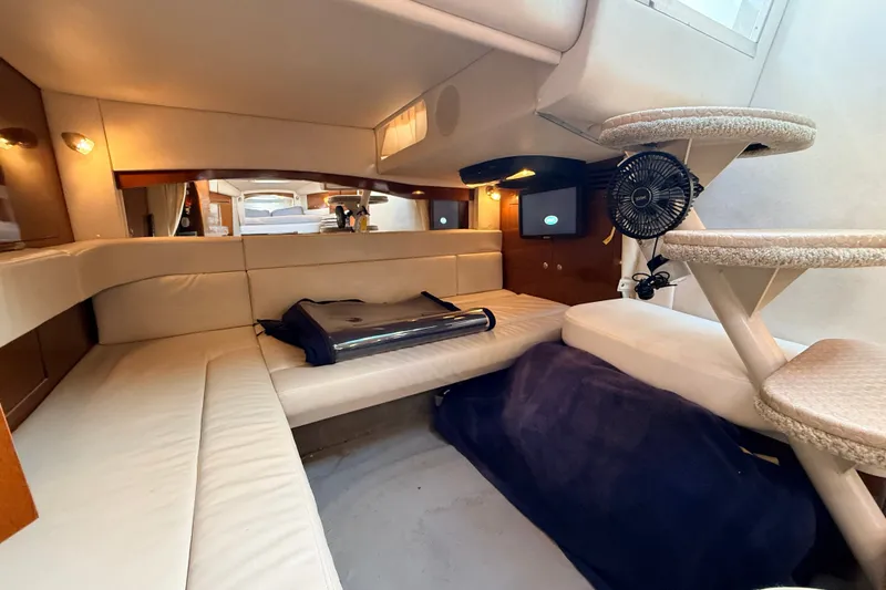 Slide: The Image of Interior of 2008 Sea Ray 340 Sundancer yacht with cozy seating and modern amenities. - 27
