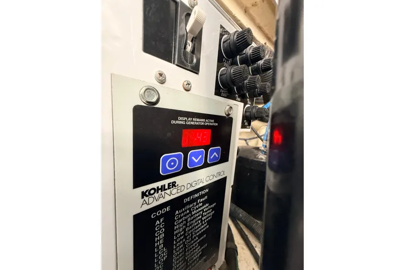 Slide: The Image of Kohler advanced digital control panel on 2008 Sea Ray 340 Sundancer boat. - 44