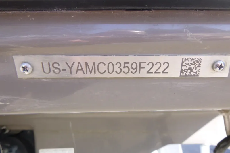 Slide: The Image of 2022 Yamaha Boats AR250 hull identification number plate with QR code. - 18