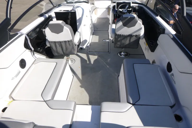 Slide: The Image of 2022 Yamaha Boats AR250 interior with modern seating and sleek design. - 5