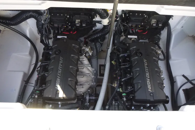 Slide: The Image of 2022 Yamaha Boats AR250 engine compartment with dual high-output engines. - 16
