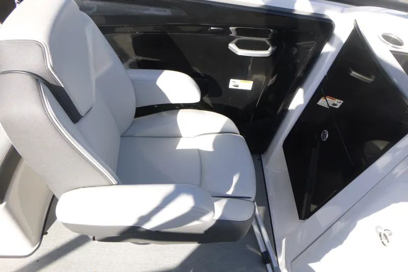 Slide: The Image of 2022 Yamaha Boats AR250 interior with gray seating and black accents. - 11