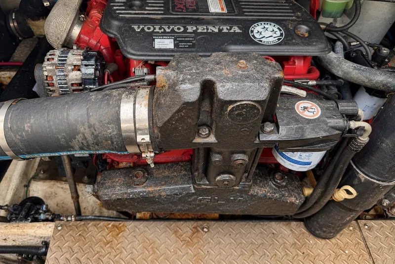 Slide: The Image of Volvo Penta engine in a 2009 Regal 4080 Sportyacht, showcasing mechanical components. - 13
