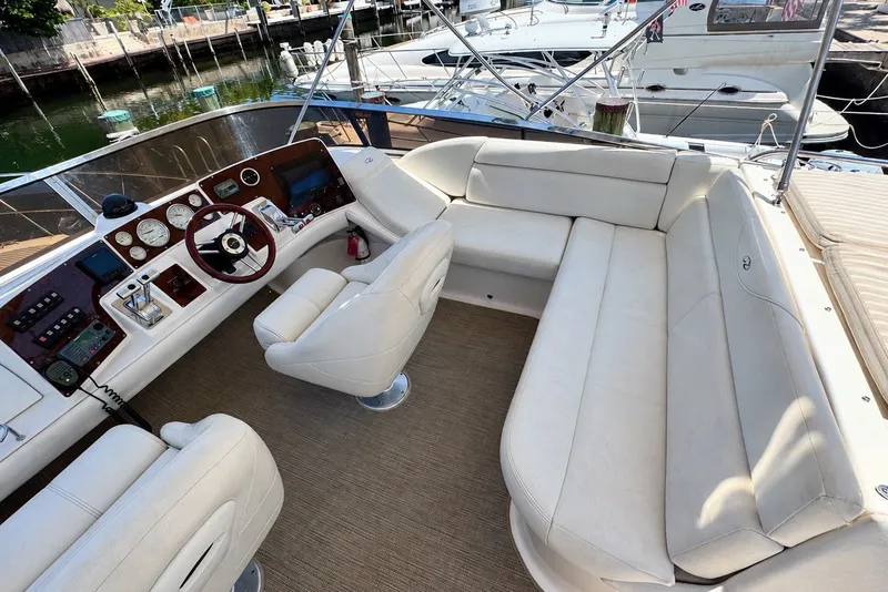 Slide: The Image of Luxurious interior of a 2009 Regal 4080 Sportyacht with plush seating and modern controls. - 4