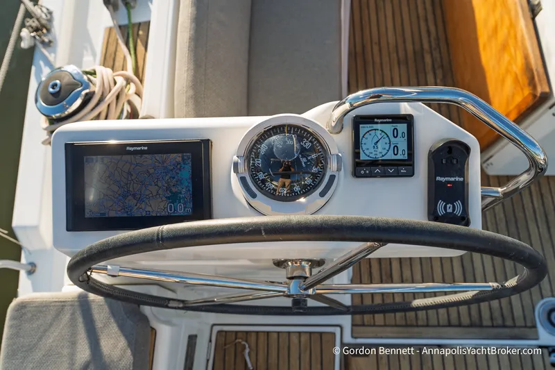 Slide: The Image of Cockpit of 2020 Jeanneau 51 yacht with navigation instruments and steering wheel. - 17