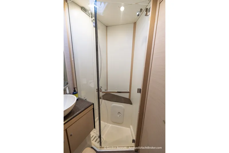 Slide: The Image of Modern shower area in 2020 Jeanneau 51 yacht, featuring sleek design and compact layout. - 37