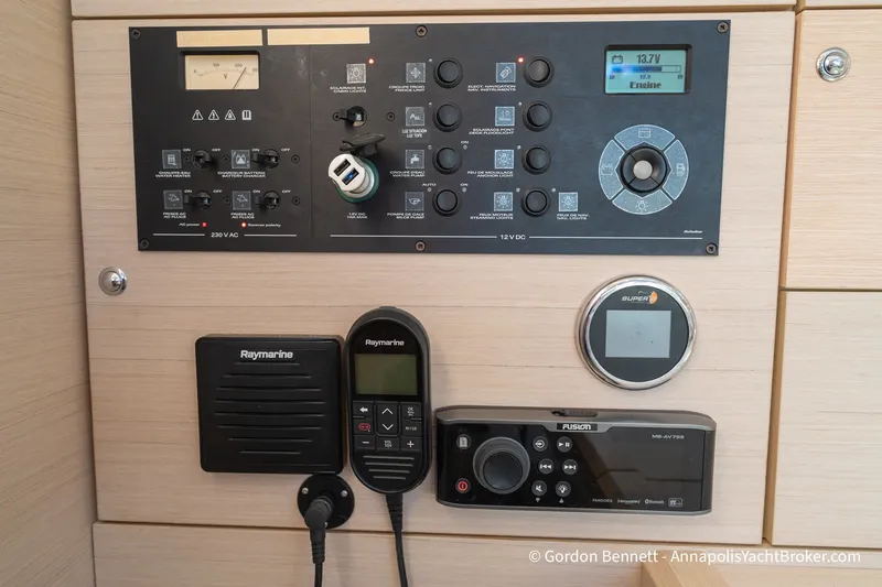 Slide: The Image of Control panel of a 2020 Jeanneau 51 yacht featuring Raymarine and Fusion systems. - 40