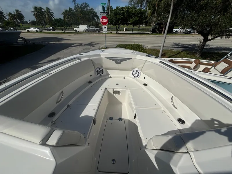 Slide: The Image of 2025 Sailfish 316 DC boat interior with spacious seating and modern design. - 18