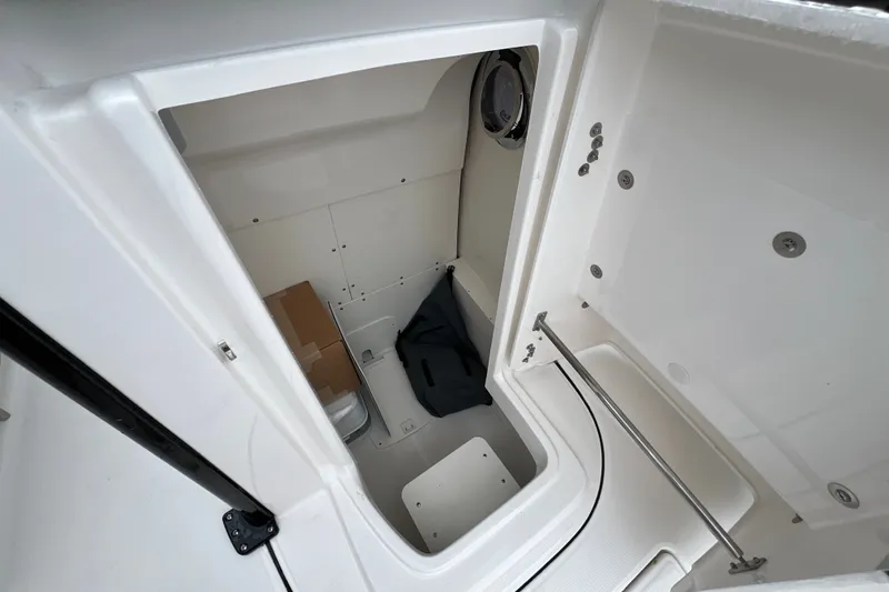 Slide: The Image of Interior storage compartment of 2027 Robalo R250 Center Console boat. - 22