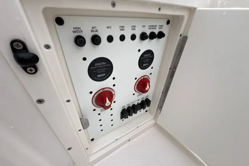 Slide: The Image of Electrical control panel on a 2027 Robalo R250 Center Console boat. - 14