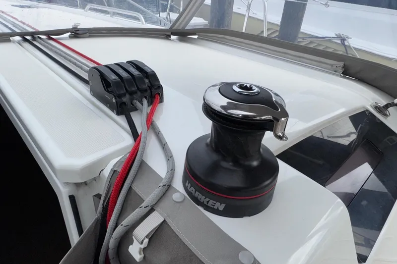 Slide: The Image of Winch and ropes on 2022 Beneteau Oceanis 40.1 sailboat deck. - 16