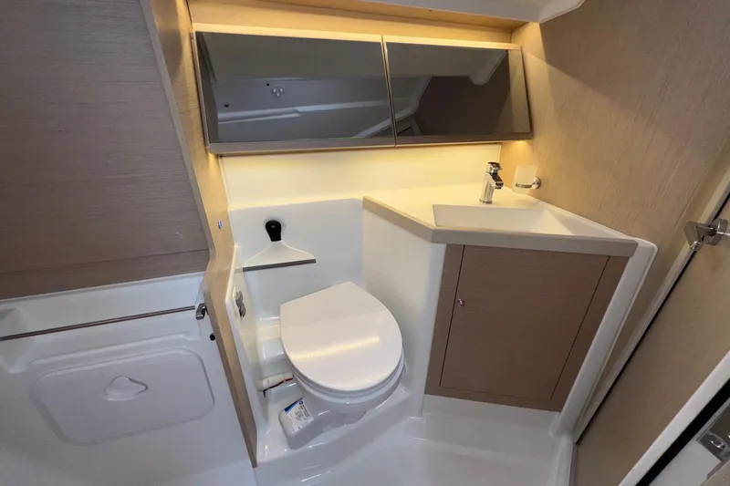 Slide: The Image of Modern bathroom in 2022 Beneteau Oceanis 40.1 yacht, featuring sleek fixtures and ample storage. - 45