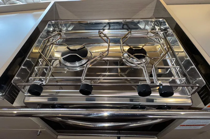 Slide: The Image of Stainless steel stove in 2022 Beneteau Oceanis 40.1 yacht kitchen. - 31