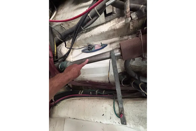 Slide: The Image of Engine room of 1991 Kha Shing Motoryacht showing mechanical components and wiring. - 37