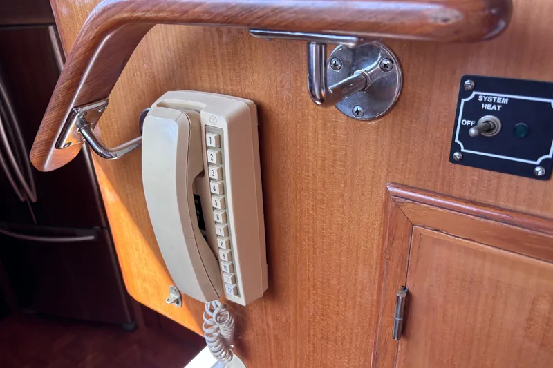Slide: The Image of Vintage telephone on 1991 Kha Shing Motoryacht with wooden panel and system heat switch. - 30