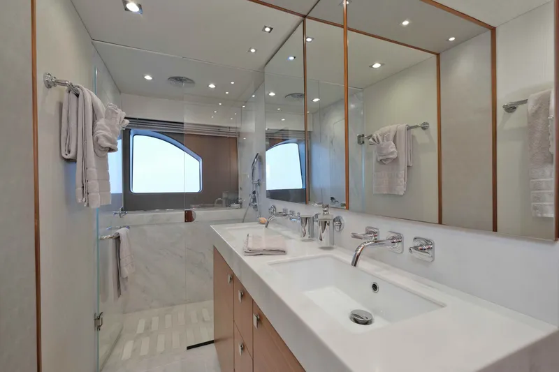 Slide: The Image of Luxurious bathroom interior on 2018 Sunseeker 76 Yacht, featuring modern fixtures and elegant design. - 69