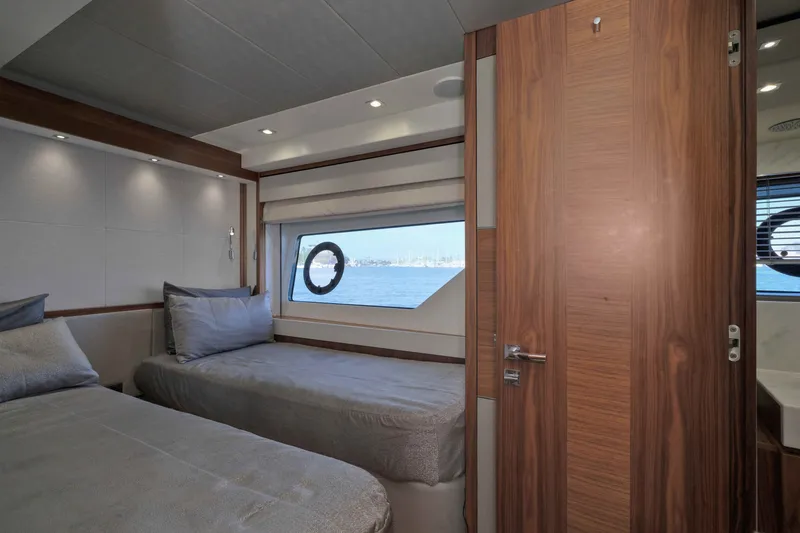 Slide: The Image of Luxurious cabin interior of 2018 Sunseeker 76 Yacht with twin beds and ocean view. - 52