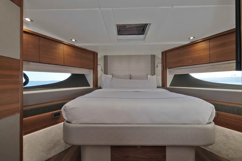Slide: The Image of Luxurious bedroom interior of 2018 Sunseeker 76 Yacht with elegant wood finishes. - 58