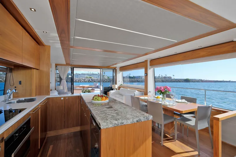 Slide: The Image of Luxurious interior of 2018 Sunseeker 76 Yacht with elegant dining area and ocean view. - 14