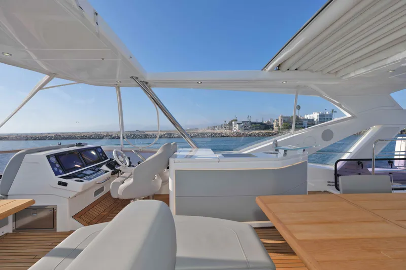 Slide: The Image of Luxurious 2018 Sunseeker 76 Yacht interior with modern helm and ocean view. - 44