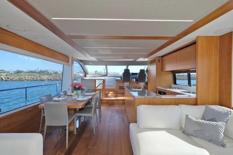 Slide: The Image of Luxurious interior of 2018 Sunseeker 76 Yacht with elegant dining and seating area. - 21