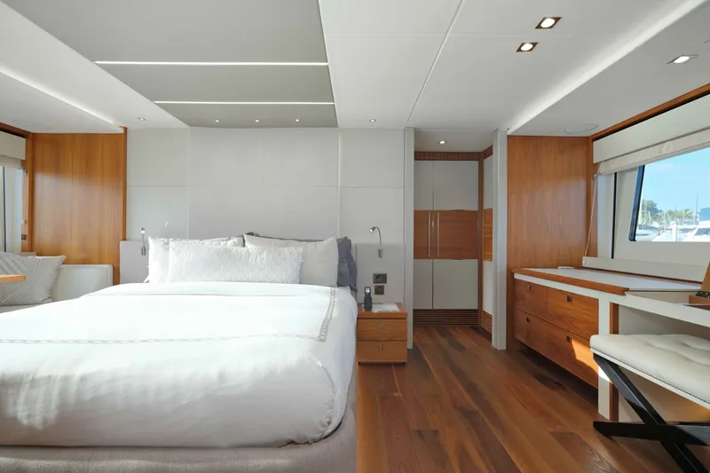 Slide: The Image of Luxurious Sunseeker 76 Yacht 2018 bedroom with modern design and elegant wood accents. - 49