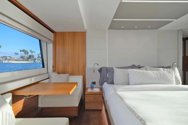 Slide: The Image of Luxurious interior of 2018 Sunseeker 76 Yacht with elegant bedroom and scenic window view. - 67