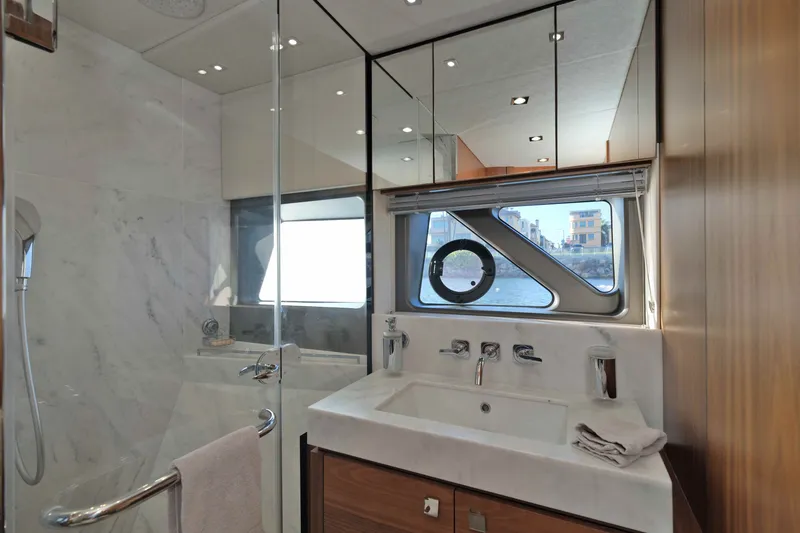 Slide: The Image of Luxurious bathroom interior of 2018 Sunseeker 76 Yacht with modern fixtures and scenic window view. - 57