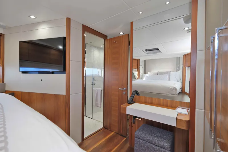 Slide: The Image of Luxurious interior of 2018 Sunseeker 76 Yacht featuring a bedroom and modern amenities. - 61
