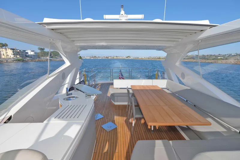 Slide: The Image of Luxurious 2018 Sunseeker 76 Yacht with spacious deck, elegant seating, and stunning ocean views. - 43