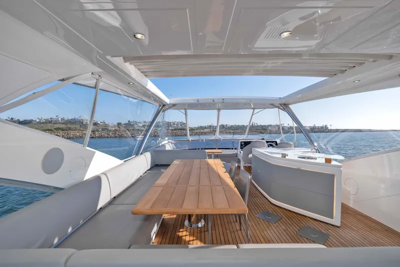 Slide: The Image of Luxurious 2018 Sunseeker 76 Yacht interior with elegant seating and panoramic ocean views. - 37