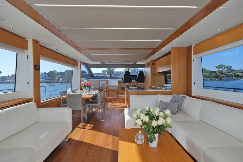 Slide: The Image of Luxurious interior of 2018 Sunseeker 76 Yacht with elegant seating and dining area. - 25