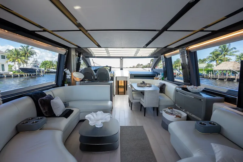 Slide: The Image of Luxurious interior of 2023 Azimut S8 yacht with modern seating and waterfront views. - 56