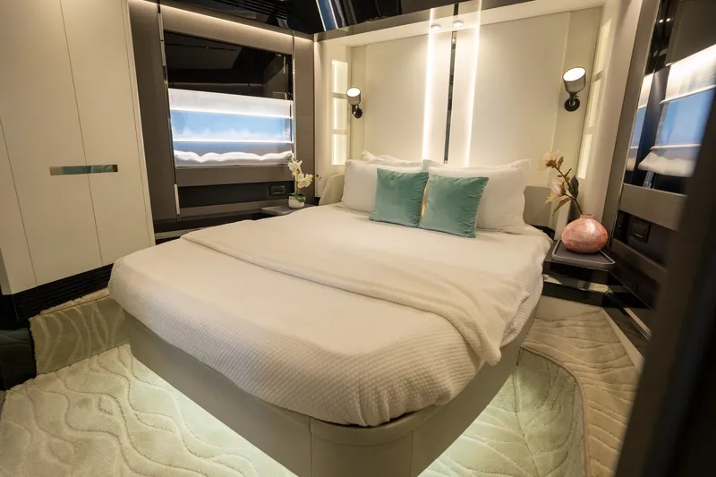 Slide: The Image of Luxurious bedroom interior of 2023 Azimut S8 yacht with elegant decor and ambient lighting. - 16