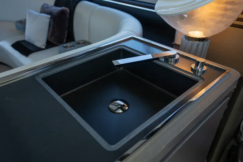 Slide: The Image of Luxurious interior of 2023 Azimut S8 yacht featuring a sleek modern sink design. - 61