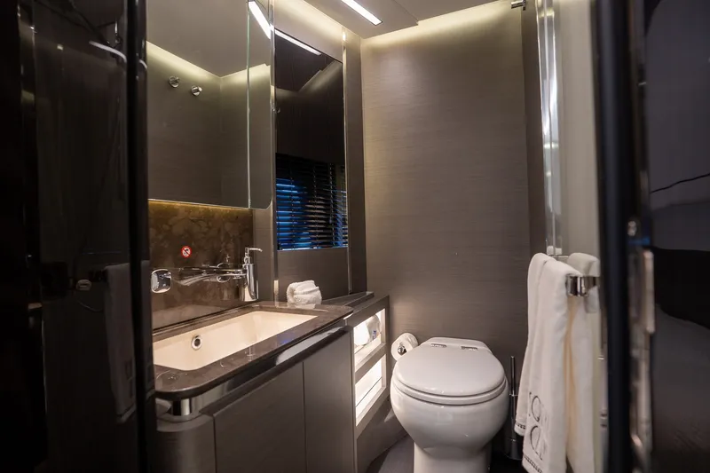 Slide: The Image of Luxurious bathroom interior of 2023 Azimut S8 yacht, featuring modern fixtures and elegant design. - 18