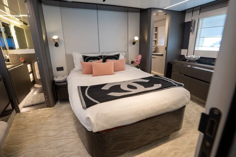 Slide: The Image of Luxurious bedroom interior of 2023 Azimut S8 yacht, featuring elegant decor and modern amenities. - 32