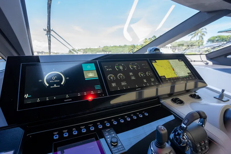 Slide: The Image of 2023 Azimut S8 yacht cockpit with advanced navigation displays and controls. - 45