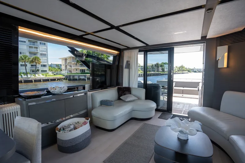 Slide: The Image of Luxurious interior of 2023 Azimut S8 yacht with modern furnishings and waterfront view. - 53