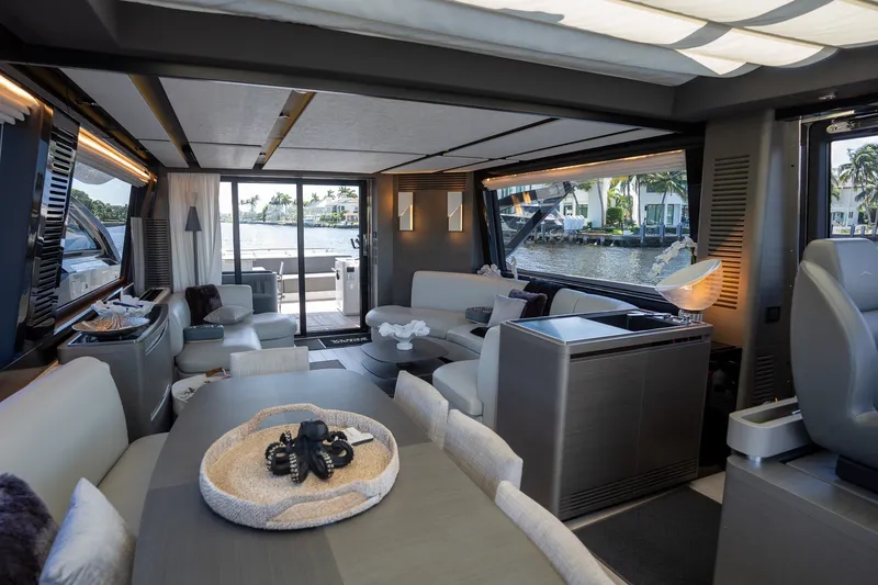 Slide: The Image of Luxurious interior of 2023 Azimut S8 yacht with modern furnishings and waterfront view. - 57