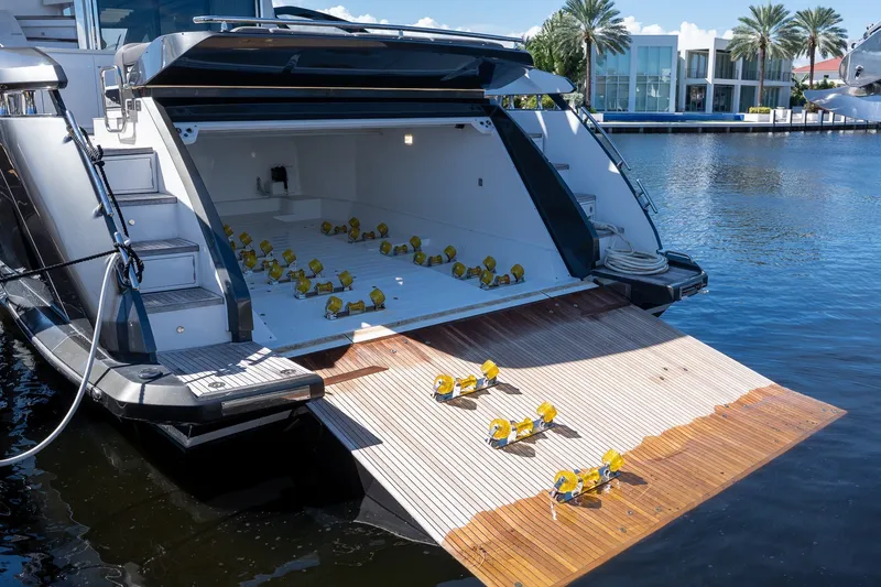 Slide: The Image of 2023 Azimut S8 yacht with open garage and water toys on deck. - 69