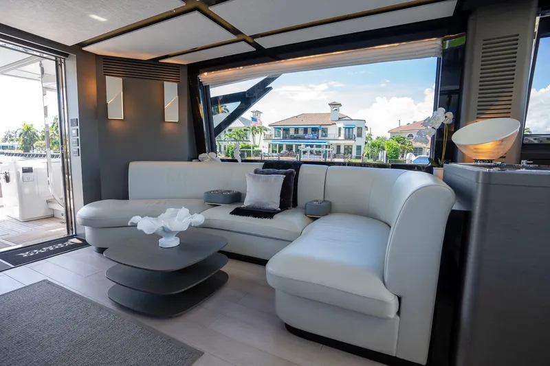 Slide: The Image of Luxurious interior of 2023 Azimut S8 yacht with modern white seating and elegant decor. - 54
