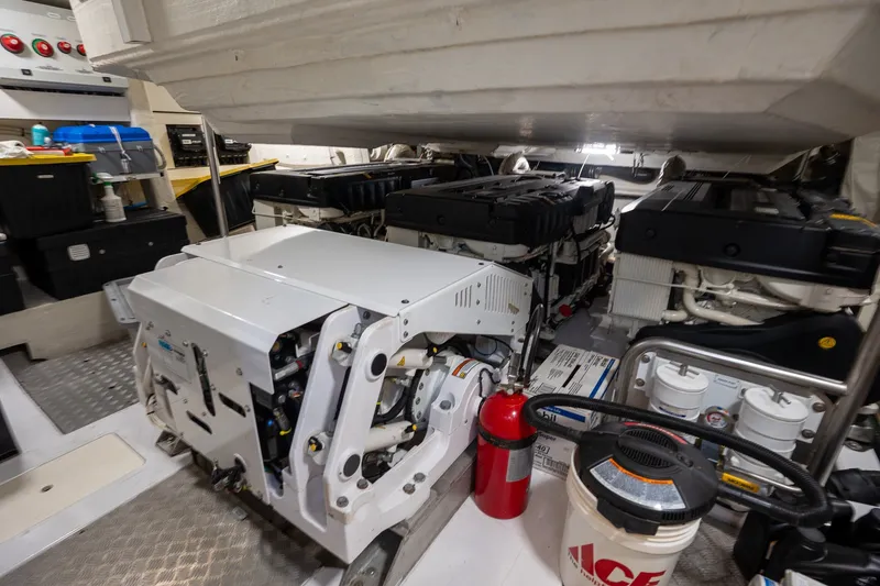 Slide: The Image of Engine room of 2023 Azimut S8 yacht, featuring advanced machinery and safety equipment. - 37