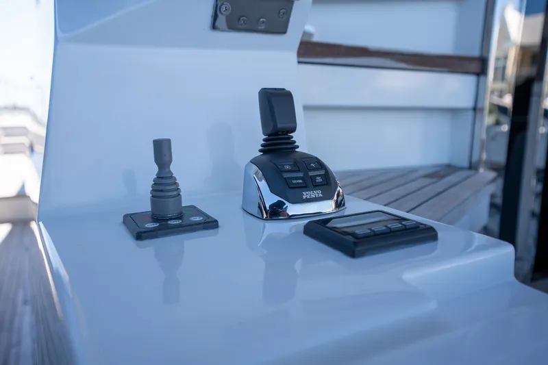 Slide: The Image of Control panel of 2023 Azimut S8 yacht featuring Volvo Penta joystick and display. - 67