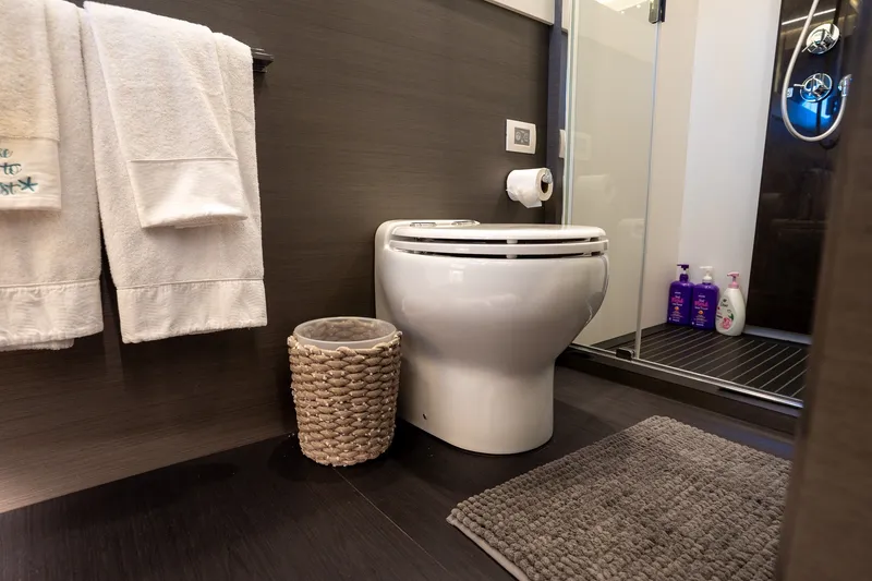 Slide: The Image of Luxurious bathroom in 2023 Azimut S8 yacht with modern fixtures and elegant decor. - 34