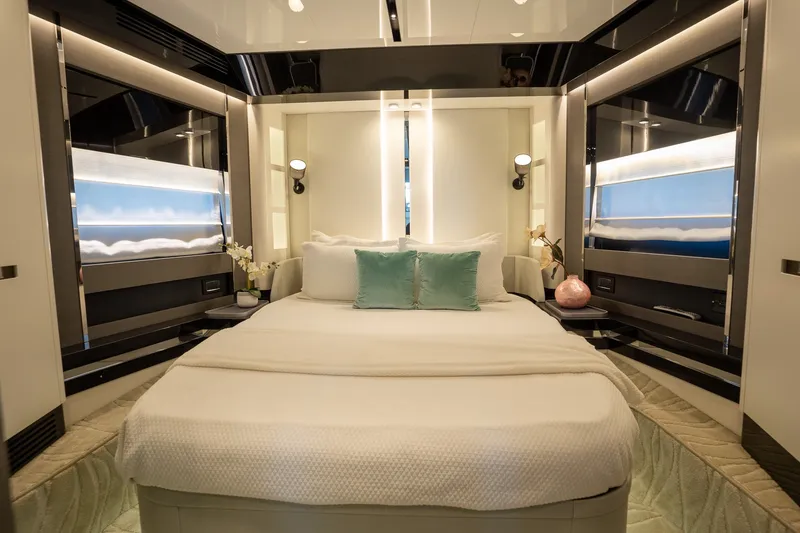 Slide: The Image of Luxurious 2023 Azimut S8 yacht bedroom with modern design and elegant lighting. - 17