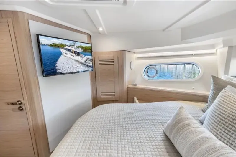 Slide: The Image of Luxurious cabin interior of 2024 Beneteau Swift Trawler 41 Fly with modern amenities. - 39