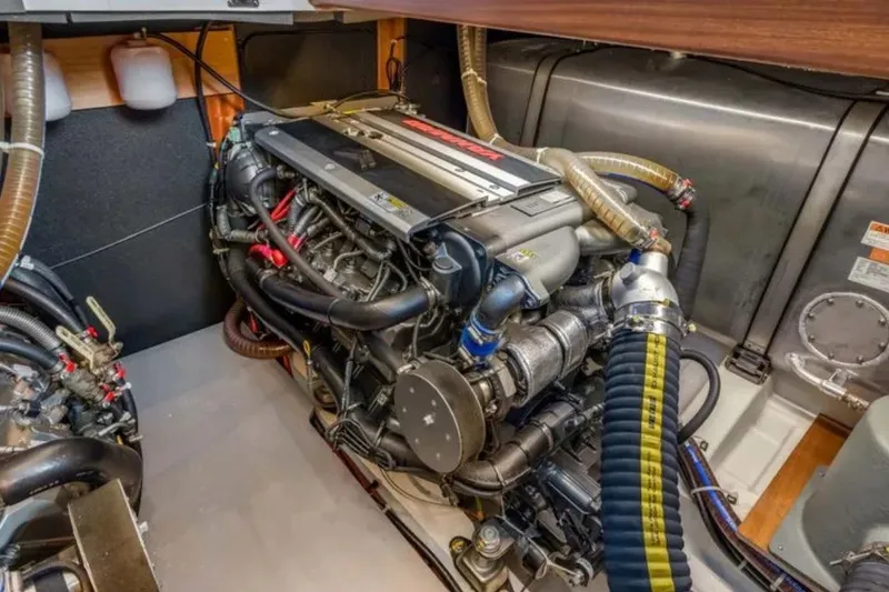 Slide: The Image of Engine room of 2024 Beneteau Swift Trawler 41 Fly, showcasing detailed mechanical components. - 46